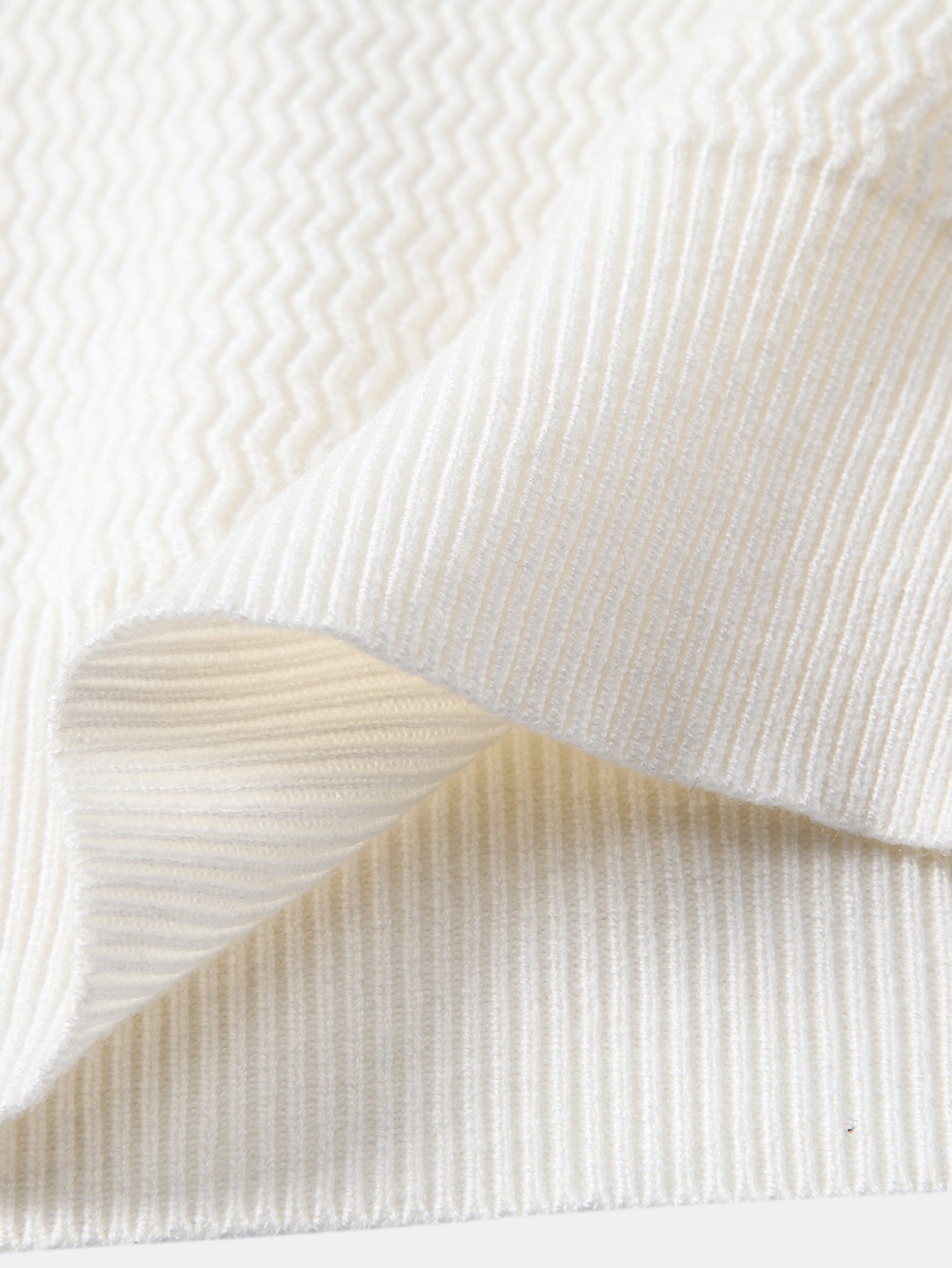 Camisa Polo de punto con cuello en V y jacquard de ondas de manga larga