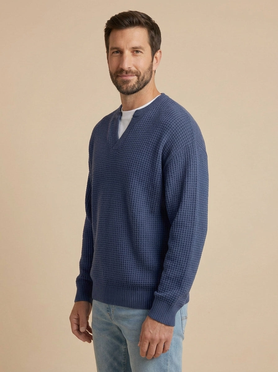 Milo jersey de punto con relieve azul marino, de lado